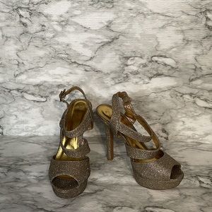 Qupid, golden sparkling heels.